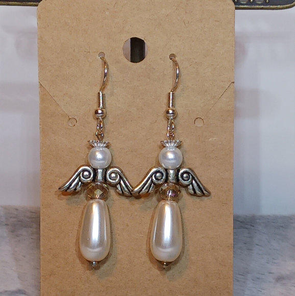 Earrings: Ivory tear drop pearl Angel on silver earwires. - Picture 3 of 5